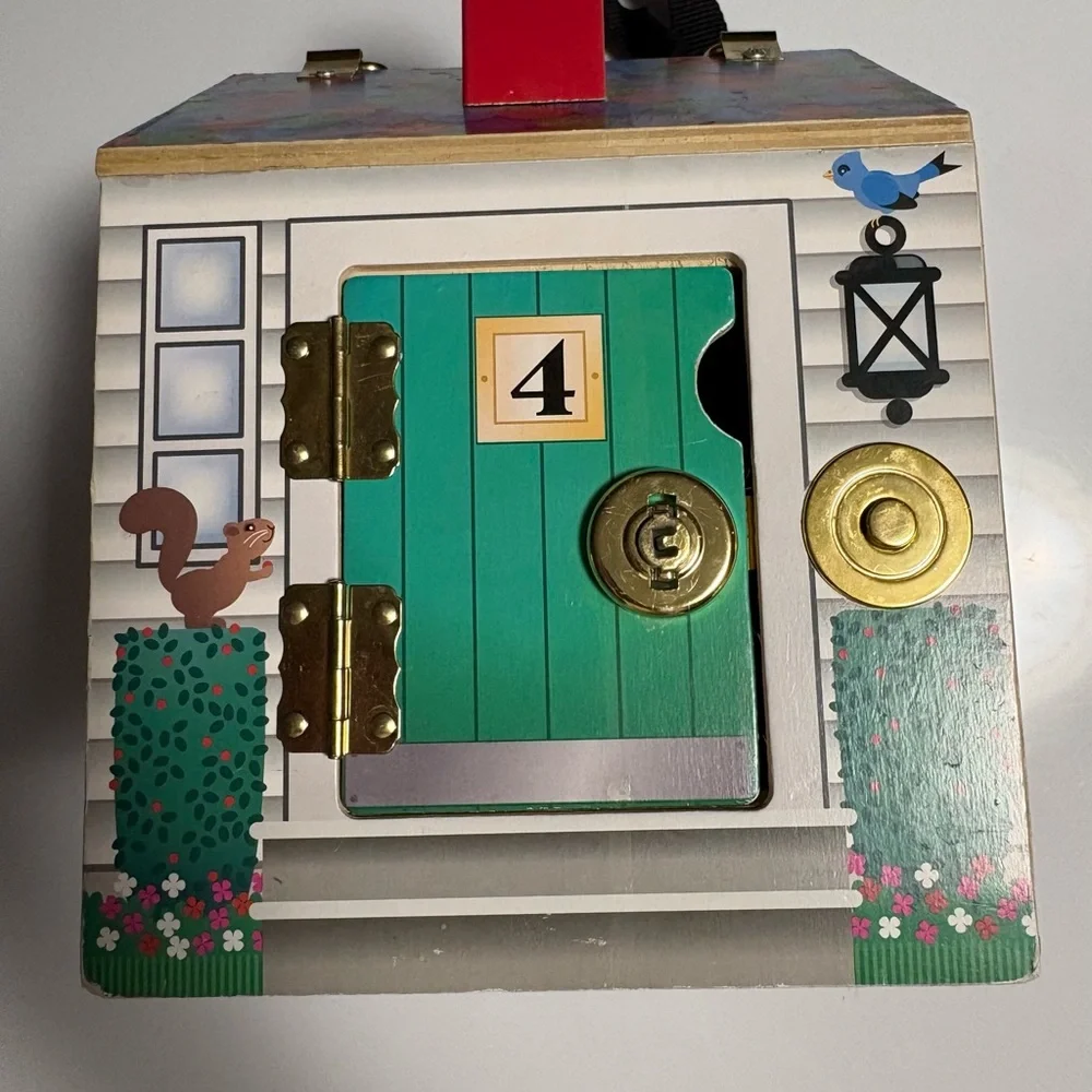 Wooden House with four keys and working doorbells
